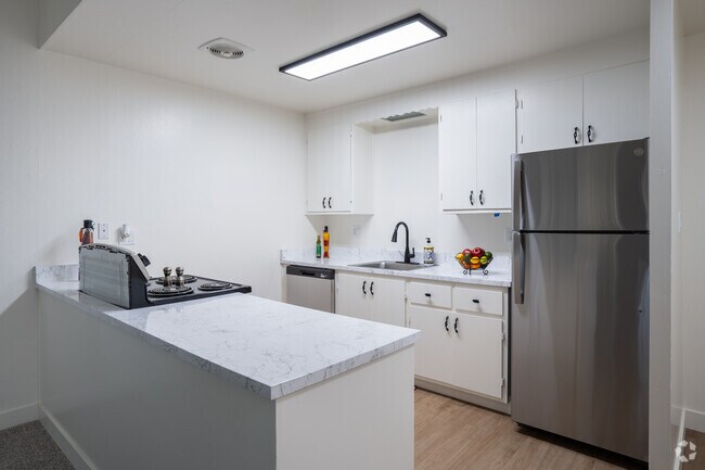 2 habitaciones, 1 baño, 900 pies cuadrados, cocina - Leafy Grove Apartments
