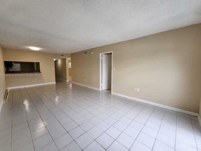 Building Photo - 9915 W Okeechobee Rd
