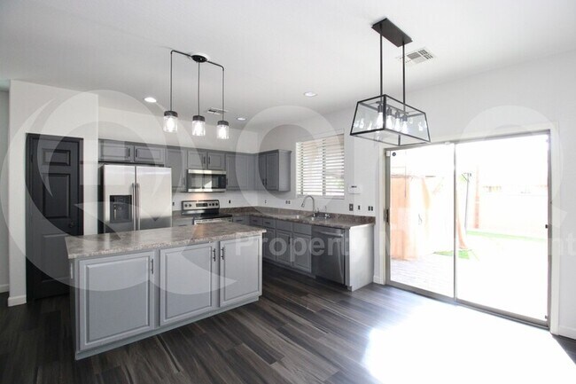 Building Photo - 15447 W Poinsettia Dr