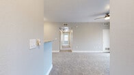 This contemporary 810 square foot apartment in Colorado Springs offers a harmonious blend of comfort and style. The space features two bedrooms and two bathrooms, with the primary bedroom boasting a generous 150 square feet. The open-concept design seamlessly integrates the kitchen and living area, creating an inviting atmosphere for both relaxation and entertainment.

The kitchen is a highlight, showcasing sleek white cabinetry, granite countertops, and stainless steel appliances, including a built-in microwave. The wood-look flooring in the kitchen and bathrooms adds warmth and durability, while plush carpeting in the bedrooms and living areas provides comfort underfoot.

Both bathrooms are thoughtfully designed with modern fixtures, including a combination tub/shower in one and a spacious vanity with ample storage in the other. The neutral color palette throughout the apartment, featuring light gray walls and white trim, creates a calming ambiance and allows for versatile decorating options.

Large windows in the bedrooms and living area flood the space with natural light, while a ceiling fan in the living room ensures comfort. A standout feature is the balcony access, offering a private outdoor space to enjoy the Colorado air.

With its well-thought-out layout and contemporary finishes, this apartment provides a perfect balance of functionality and aesthetics for modern living in Colorado Springs.