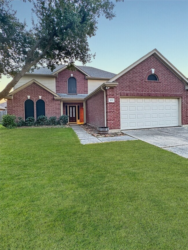 Building Photo - 18707 Woodbreeze Dr