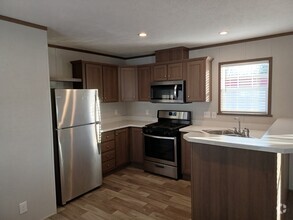 Building Photo - 211 Magnolia Pl