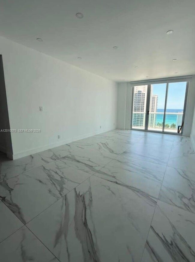 Building Photo - 19370 Collins Ave