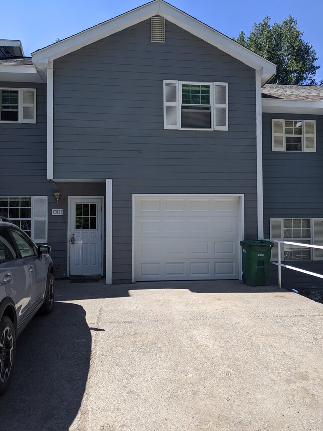 Garage & 1 Parking Spot on the drive. Another tenant rents the downstairs apartment. - 106 Spruce Ct