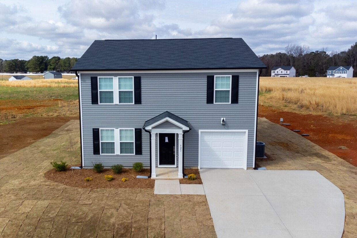 Primary Photo - Brand new 4-bedroom / 3 Bath with a main-l...