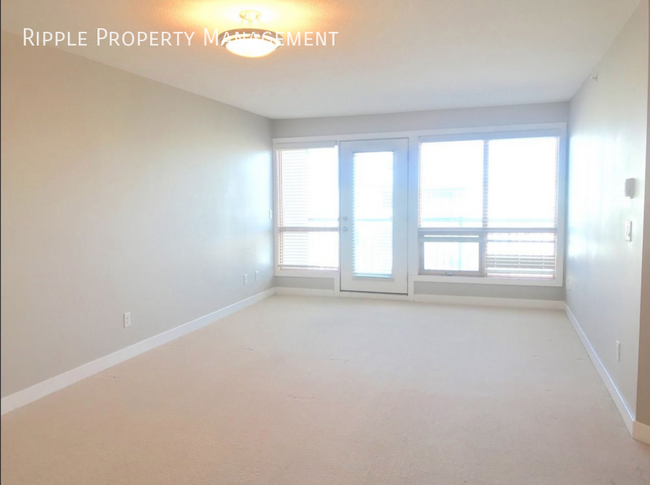 Photo du bâtiment - INCREDIBLE 2 BEDS/ 1 BATHS CONDO