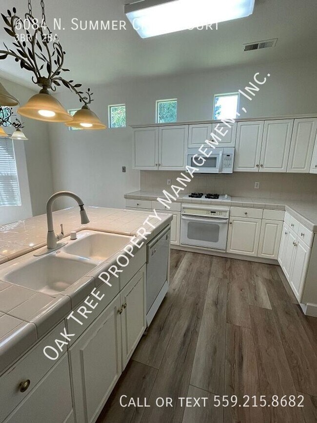Building Photo - 6084 N Summer Creek Ct