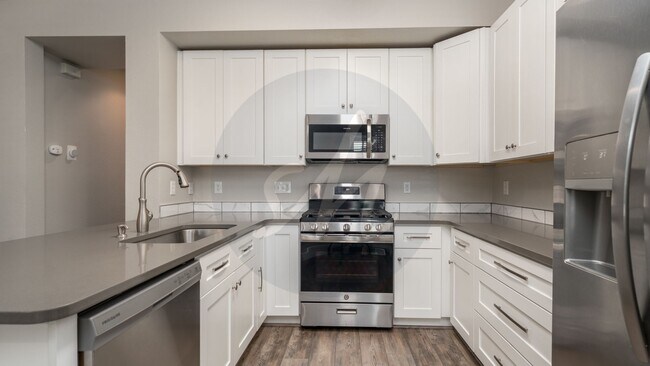 Building Photo - 2 Bedroom Wolf Ranch Townhome with 2 Car Garage