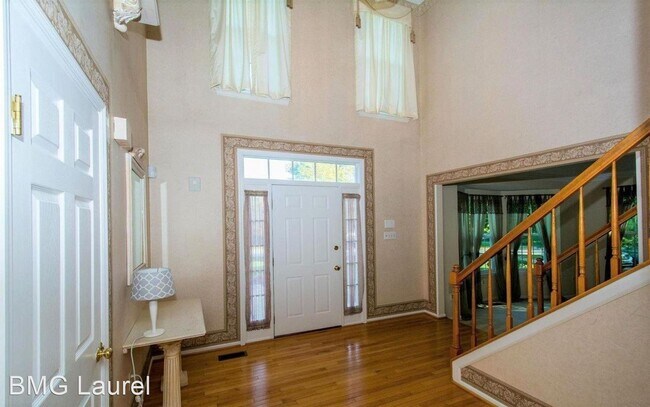 Building Photo - 4 br, 3.5 bath House - 7883 Rockburn Dr