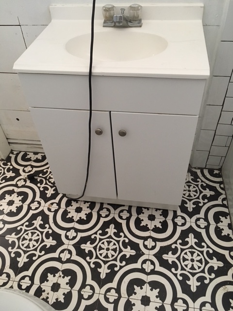 Gorgeous tile floors in bathroom, hall and closet - 1133 W Lynwood Ave