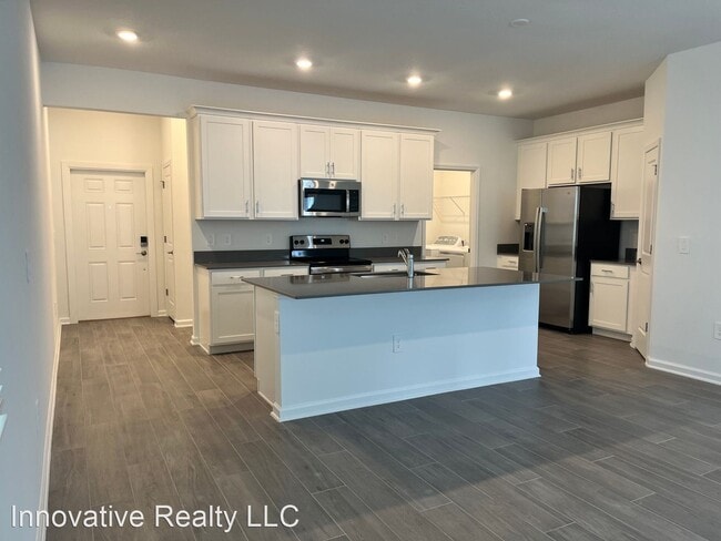 Building Photo - 3 br, 2.5 bath House - 2437 Relaxing Lane