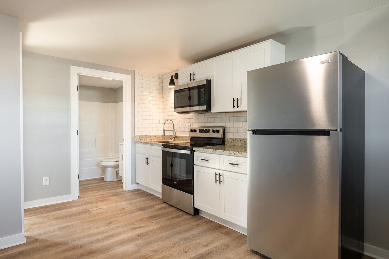 Primary Photo - Discover Modern Living at Genesis Apartmen...