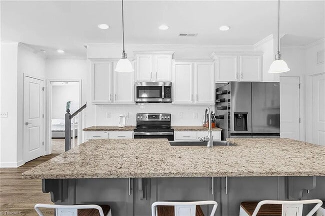 Building Photo - Earn Wealth While Leasing - Like a Homeown...