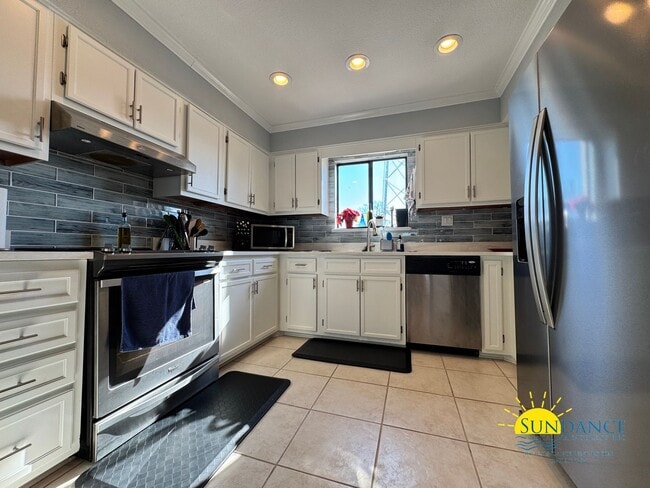 Building Photo - Waterfront Luxury Living on Garniers Bayou with Boat Slip/Lift Included!