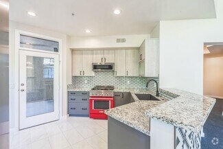 Building Photo - 880 E Palm Canyon Dr