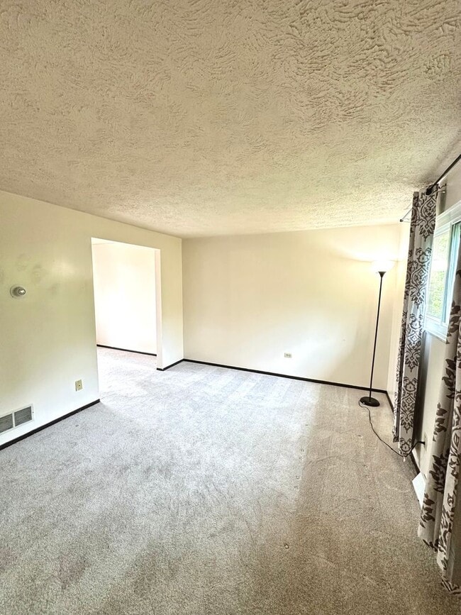 Photo - Well-Maintained 2 Bed, 1 Bath Townhome in West Mifflin - Private Balcony, Central AC & Heat - Ava...