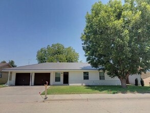 Building Photo - 1810 W Currier Ave