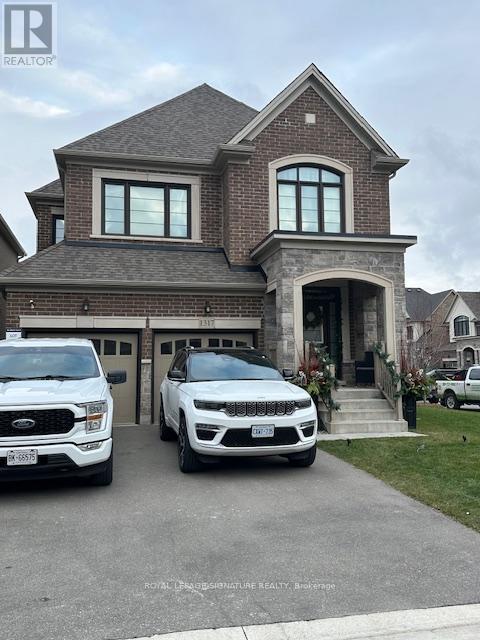 Photo du bâtiment - 1317 Raspberry Ter