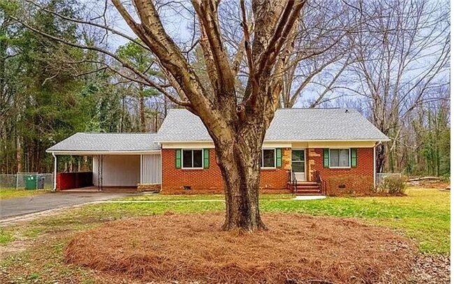 Building Photo - Beautiful full-brick 1-story home set back...
