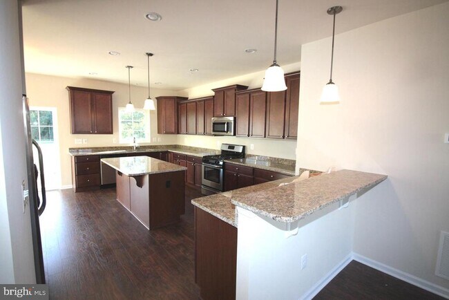 Foto del edificio - 7478 Tanyard Knoll Ln