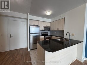 Building Photo - 5740 Yonge St