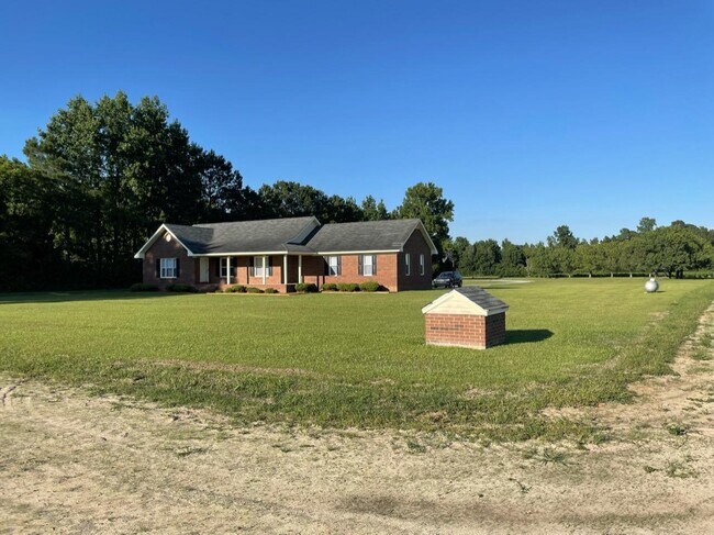 Property view with pump house - 4528 NC Hwy 242 S