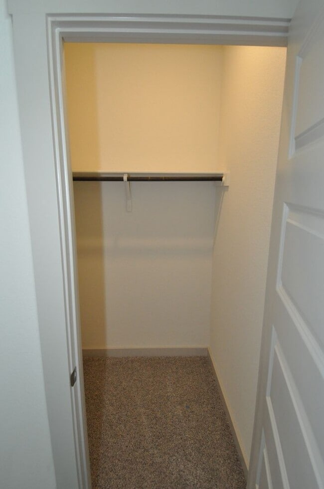 Building Photo - Home has an amazing entrance leading to the large family room open to the kitchen and dining room