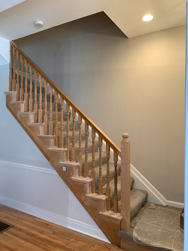 Duplex up to three bedrooms, full bath and bonus space with skylights. - 1648 N Claremont Ave
