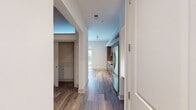 This 450 square foot apartment in Philadelphia offers a thoughtfully designed living space that maximizes efficiency without compromising on style. The open-concept layout creates a sense of spaciousness, with the kitchen seamlessly integrated into the main living area. The kitchen boasts modern, wood-grain cabinetry, stainless steel appliances, and a stylish backsplash, creating a contemporary aesthetic.

The 120 square foot bedroom provides a cozy retreat, featuring warm wood-look flooring and ample natural light. The bathroom is a study in modern luxury, with a glass-enclosed shower, sleek vanity, and marble-look tile flooring. Throughout the apartment, the color palette is neutral and calming, enhancing the sense of space.

Large windows in the living area flood the space with natural light and potentially offer urban views. The apartment's efficient design includes built-in storage solutions and multi-functional spaces, making the most of every square foot. Located at 322 N Broad St in Philadelphia, this apartment combines urban convenience with contemporary comfort, perfect for those seeking a stylish city dwelling.