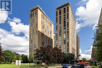 Building Photo - 105-1105 Champagne Ave S