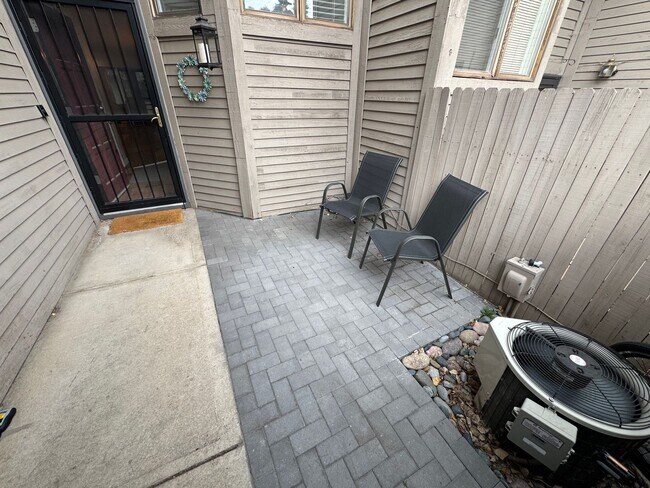 Building Photo - Bright 2BR Townhome with 3 Balconies & Private Patio