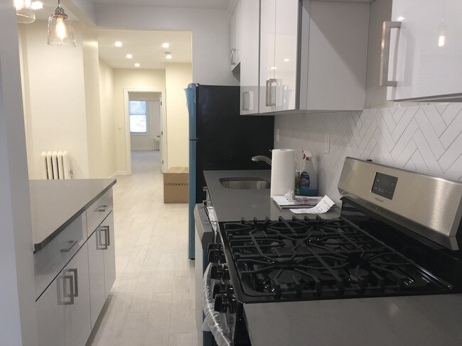 Building Photo - 34-50-50 42nd St