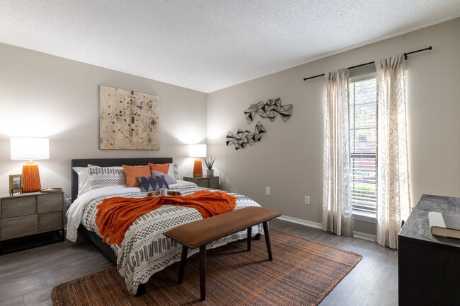Bedroom with Large Window - The Augusta Apartments