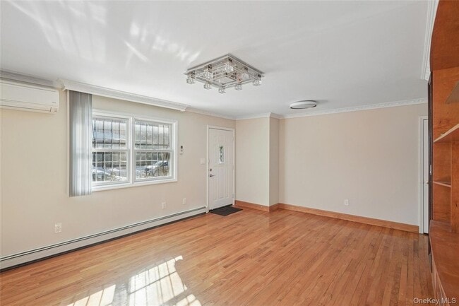 Building Photo - 214-27 38th Ave