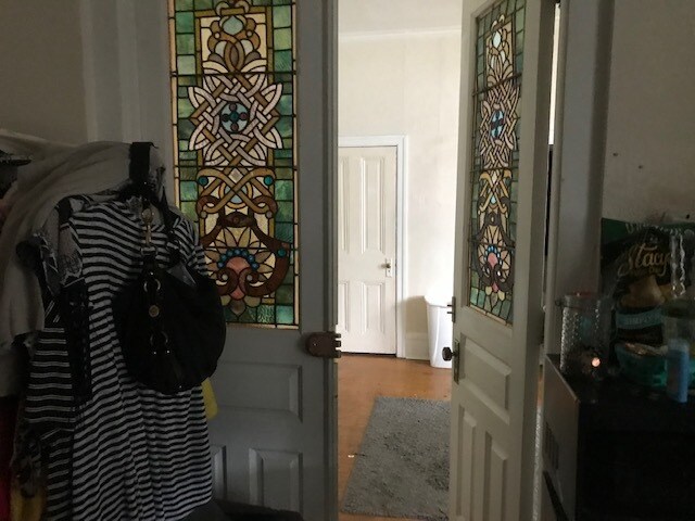 front bedroom with stained glass windows on bedroom doors - 3416 Race St
