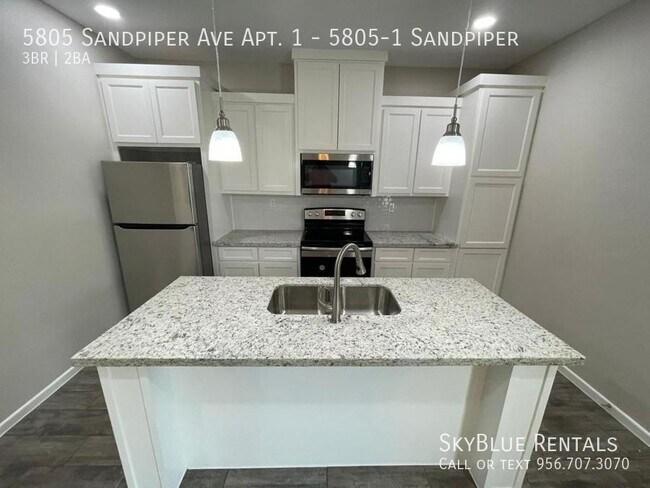 Foto del edificio - 5805 Sandpiper-UNDER CONTRACT, 5805-1 Sand...