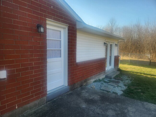 Building Photo - Spacious home on a corner lot with a large...