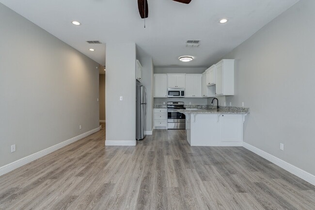 Building Photo - Stunning 3 Story Town-Home near Texas Tech...