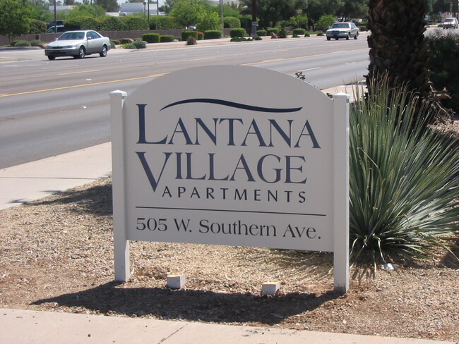 Lantana Village signage on Southern Ave. - Lantana Village Apartments