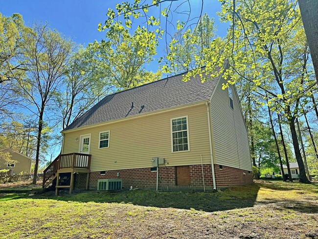 Building Photo - Cape Cod on Large Wooded Lot