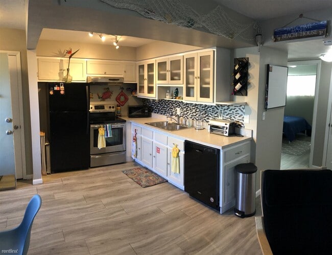 Building Photo - 2 br, 1 bath Condo - La Riviere Condos