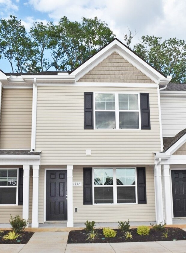 Primary Photo - Wonderful 2BR/2.5BA Mboro townhome- 1 mile...