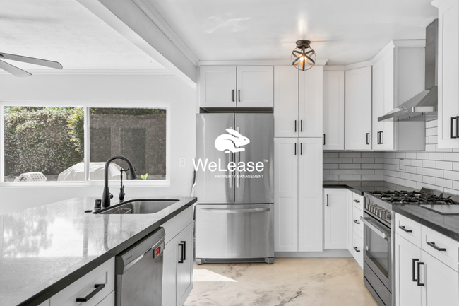 Building Photo - Call this beautiful 5bed 2.5 bath Home in ...