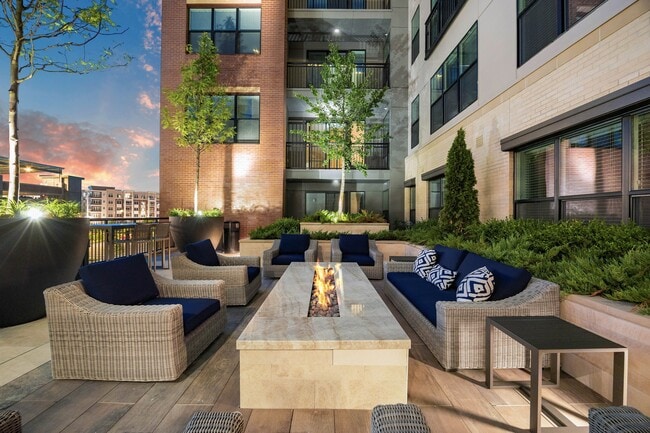 Social courtyards featuring a variety of cozy seating areas - Tuscan Village