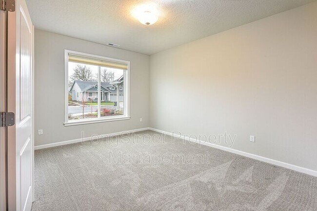 Building Photo - 7196 SE Cheryl Ct