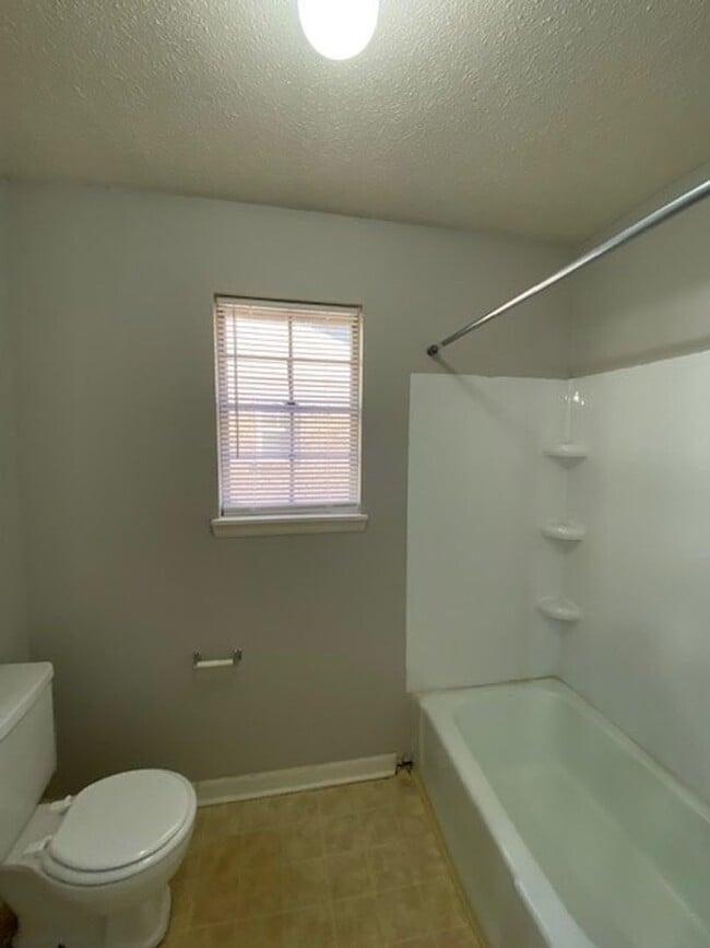 Building Photo - 8211 Woodview Dr N