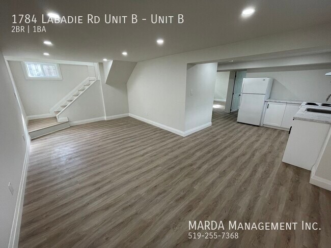 Building Photo - SPACIOUS & BRIGHT 2 BED/1 BATH LOWER UNIT + 40% UTILITIES