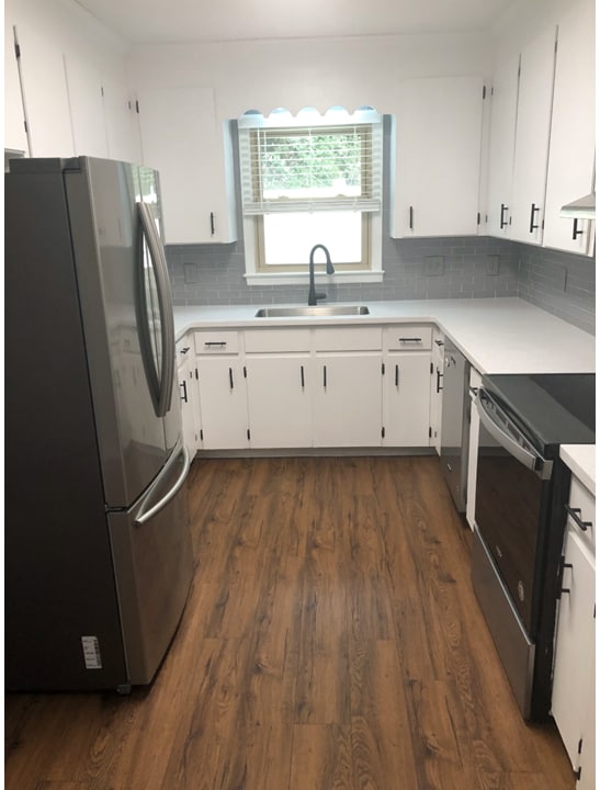Kitchen with stainless steel appliances - 313 Grace St