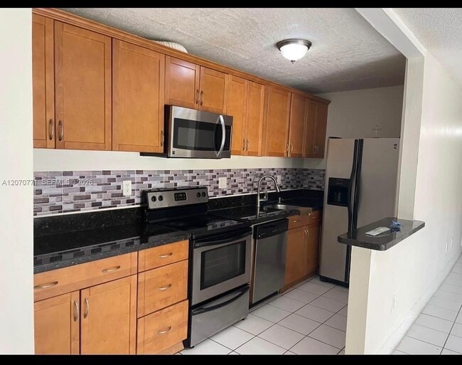 Building Photo - 4170 NW 79th Ave