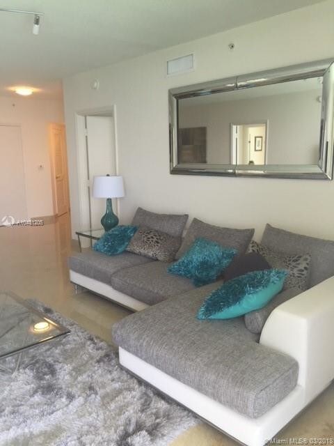 Building Photo - 16699 Collins Ave